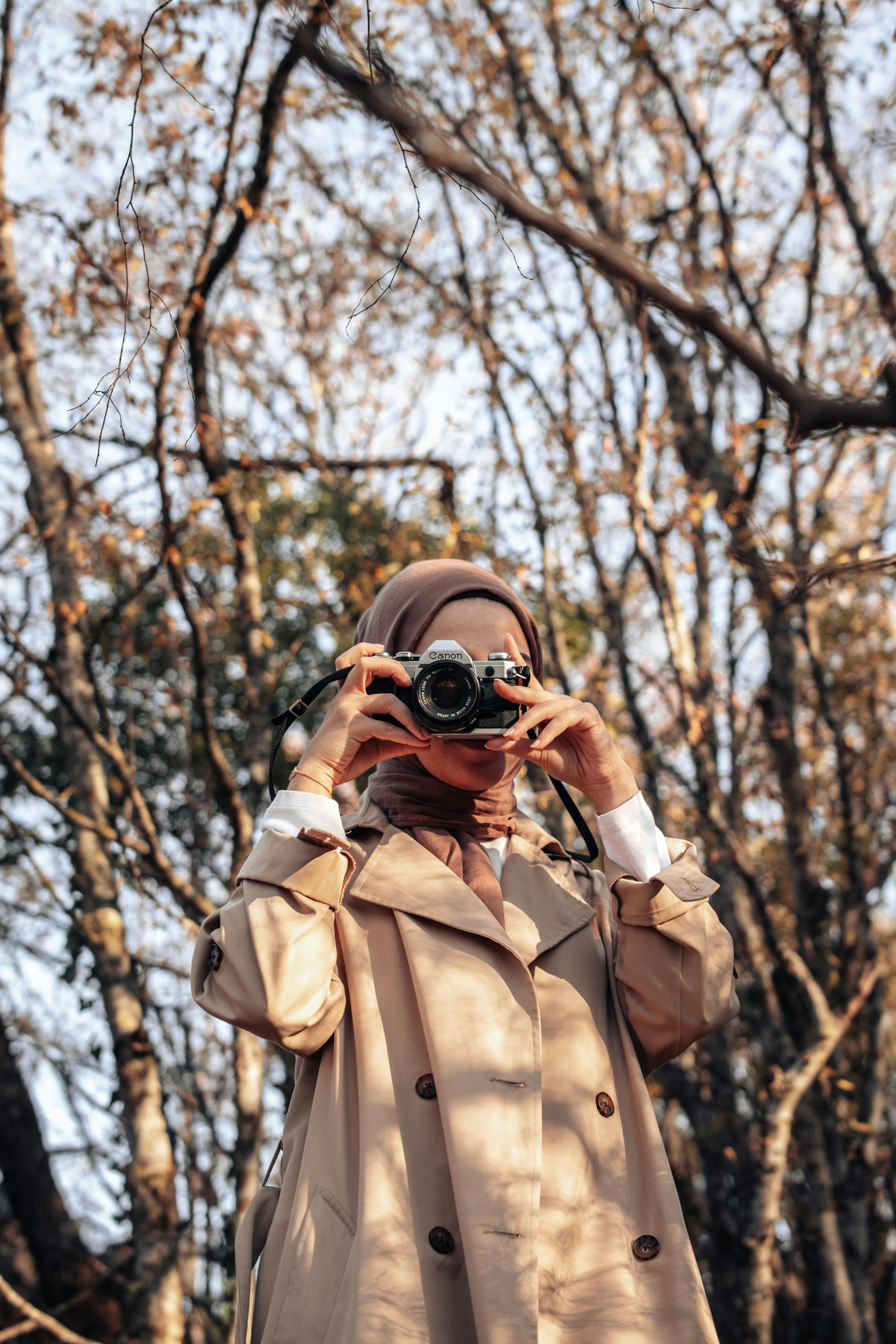 Girl Holding Camera